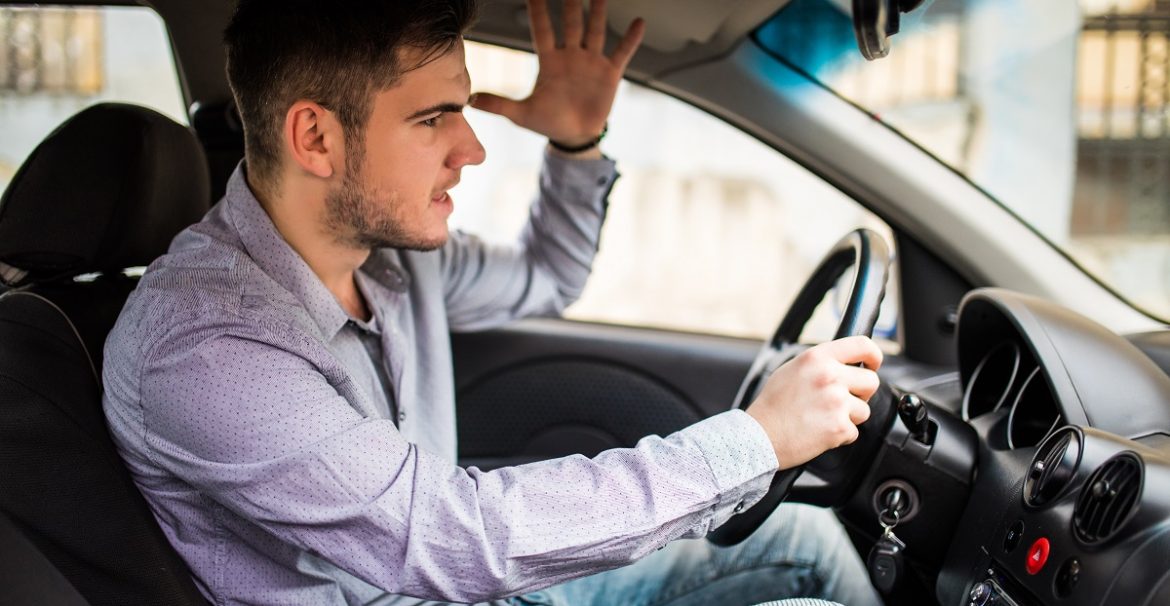 frustrated man driving